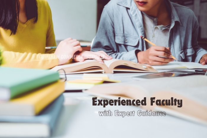 Students receiving expert guidance from experienced faculty at Gowtham Commerce Institute in Coimbatore specializing in CA and CMA coaching